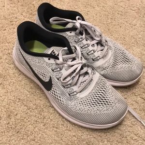 Gray Nike free runs